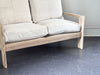 A 1970's French Two-Seater Pine Sofas with French Linen Upholstery
