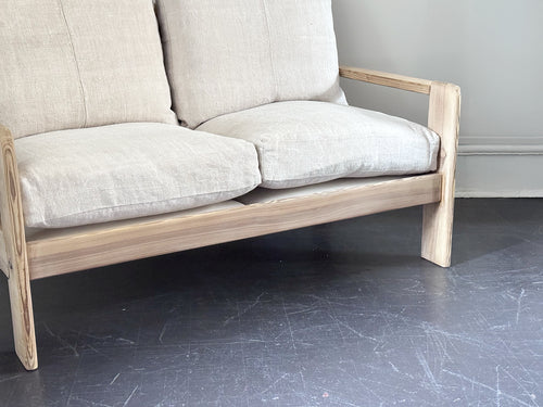 A 1970's French Two-Seater Pine Sofas with French Linen Upholstery