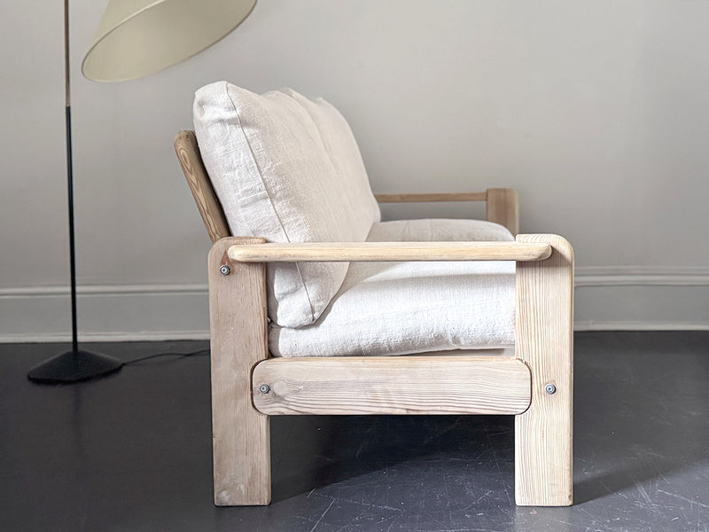 A 1970's French Two-Seater Pine Sofas with French Linen Upholstery
