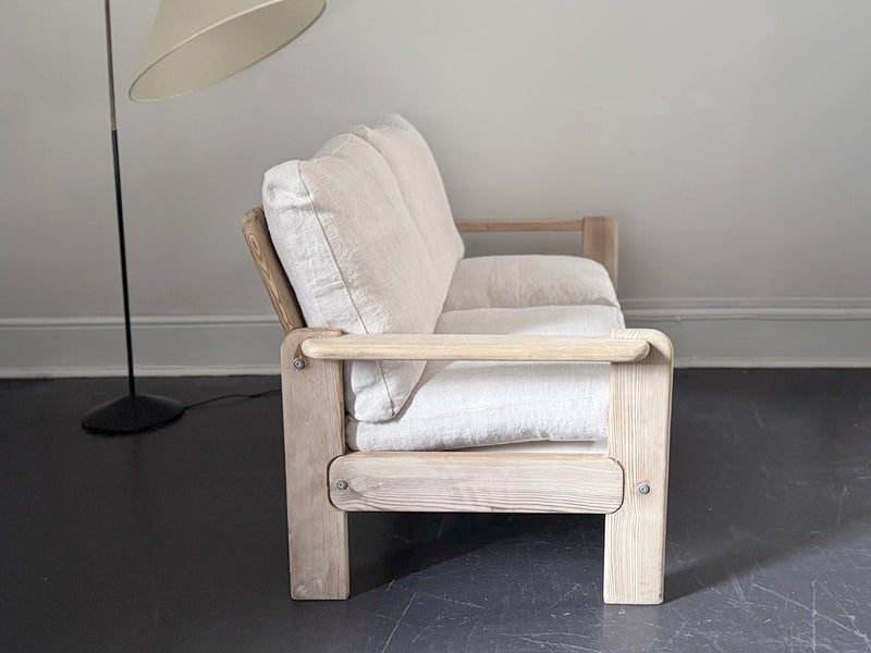 A 1970's French Two-Seater Pine Sofas with French Linen Upholstery