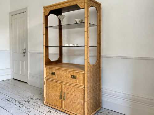 A 1970's Woven Bamboo Two Door Etagere with Glass Shelves