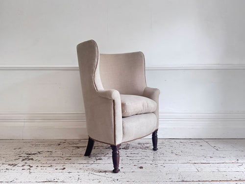 An Early 19th C Upholstered Barrel Back Armchair