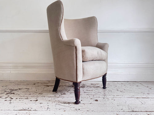 An Early 19th C Upholstered Barrel Back Armchair