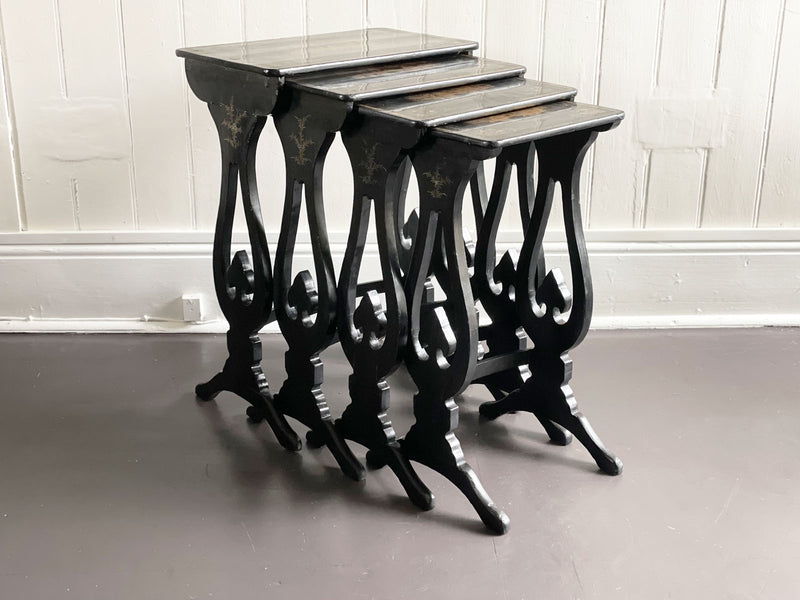 An Antique Nest of Black Lacquer Chinoiserie Tables