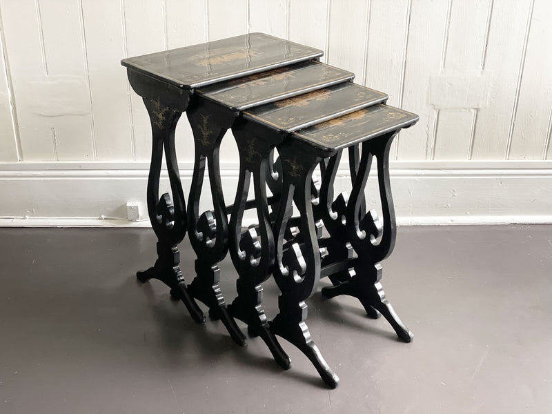 An Antique Nest of Black Lacquer Chinoiserie Tables