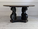 A 1920's Regency Style Ebonised Extending Dining Table