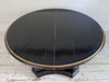 A 1920's Regency Style Ebonised Extending Dining Table