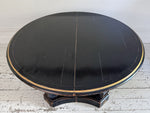 A 1920's Regency Style Ebonised Extending Dining Table