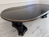 A 1920's Regency Style Ebonised Extending Dining Table
