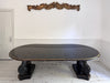 A 1920's Regency Style Ebonised Extending Dining Table