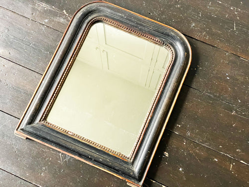 A Small Napoleon III Ebonised Mirror with Original Plate