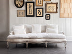 A 19th C French Camel Back Sofa with Serpentine Front