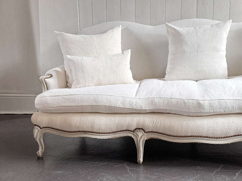 A 19th C French Camel Back Sofa with Serpentine Front