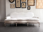 A 19th C French Camel Back Sofa with Serpentine Front
