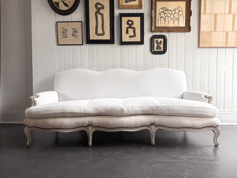 A 19th C French Camel Back Sofa with Serpentine Front