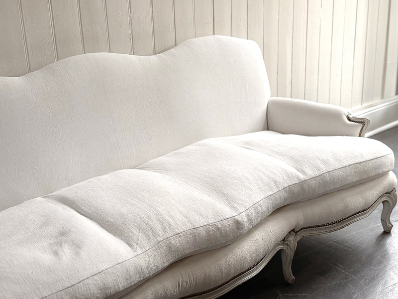 A 19th C French Camel Back Sofa with Serpentine Front