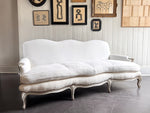 A 19th C French Camel Back Sofa with Serpentine Front