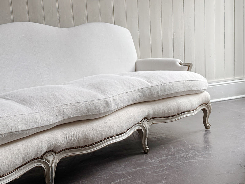A 19th C French Camel Back Sofa with Serpentine Front