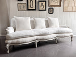 A 19th C French Camel Back Sofa with Serpentine Front