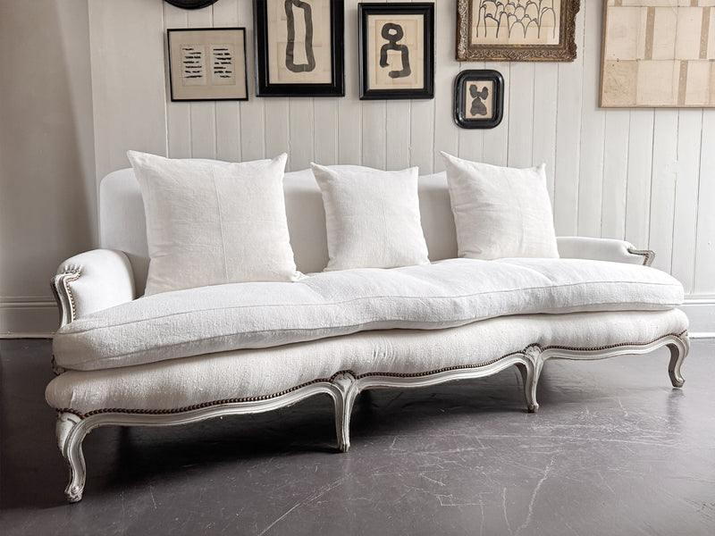 A 19th C French Camel Back Sofa with Serpentine Front