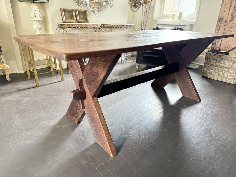 An Late 19th Century French Pine Sawbuck Trestle Table