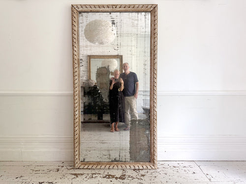 A Very Large 18th C French Carved Ribbon Mirror with Original Plate
