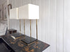 A Pair of Large 1970's Brass Plated Table Lamps on Rippled Black Bases