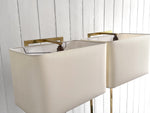 A Pair of Large 1970's Brass Plated Table Lamps on Rippled Black Bases