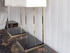 A Pair of Large 1970's Brass Plated Table Lamps on Rippled Black Bases