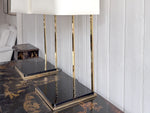 A Pair of Large 1970's Brass Plated Table Lamps on Rippled Black Bases