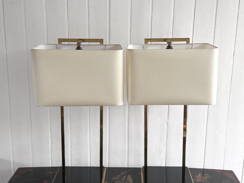 A Pair of Large 1970's Brass Plated Table Lamps on Rippled Black Bases