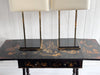 A Pair of Large 1970's Brass Plated Table Lamps on Rippled Black Bases