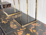 A Pair of Large 1970's Brass Plated Table Lamps on Rippled Black Bases