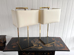 A Pair of Large 1970's Brass Plated Table Lamps on Rippled Black Bases