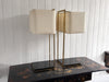 A Pair of Large 1970's Brass Plated Table Lamps on Rippled Black Bases