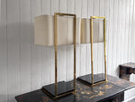 A Pair of Large 1970's Brass Plated Table Lamps on Rippled Black Bases