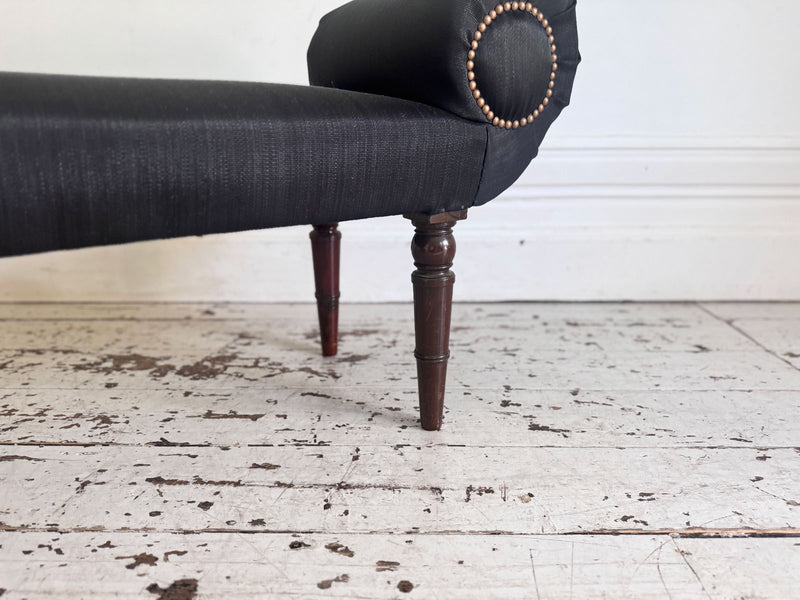 A Late Regency Upholstered Scroll End Bench with Black Horsehair Covering