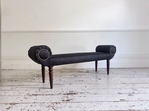 A Late Regency Upholstered Scroll End Bench with Black Horsehair Covering