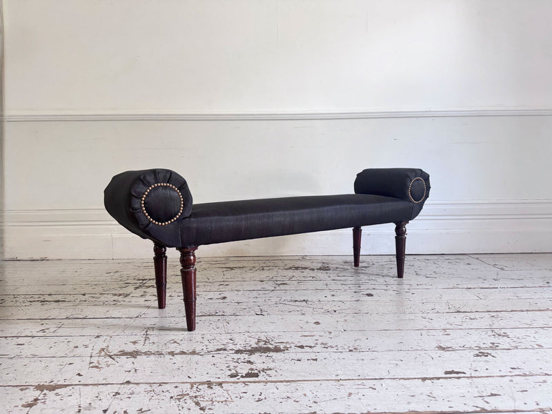 A Late Regency Upholstered Scroll End Bench with Black Horsehair Covering