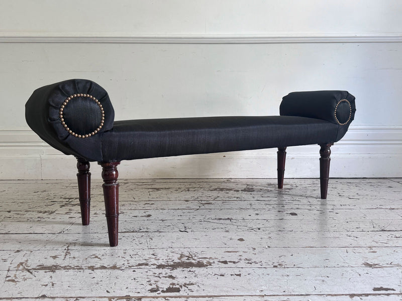 A Late Regency Upholstered Scroll End Bench with Black Horsehair Covering