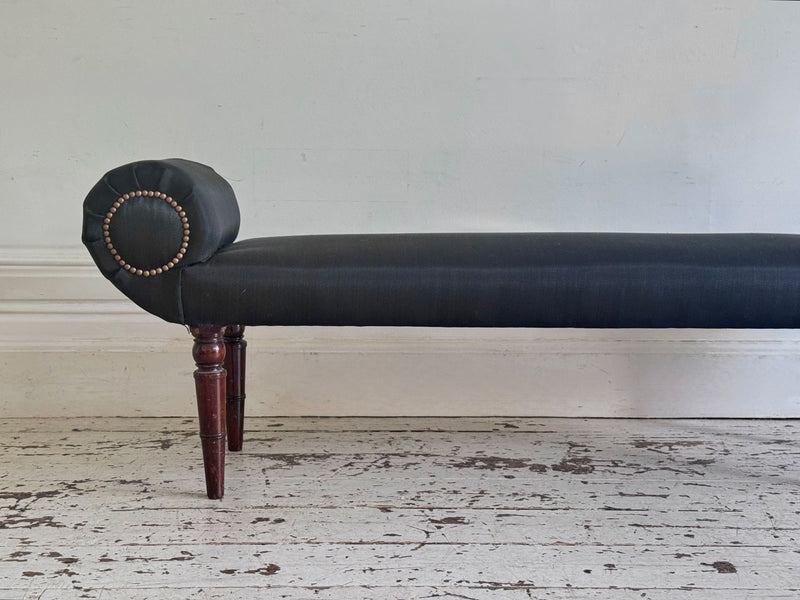 A Late Regency Upholstered Scroll End Bench with Black Horsehair Covering