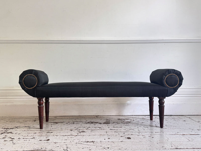 A Late Regency Upholstered Scroll End Bench with Black Horsehair Covering