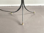 A 1950's French Black Metal Standing Lamp with Tripod BaseA 1950's French Black Metal Standing Lamp with Tripod Base