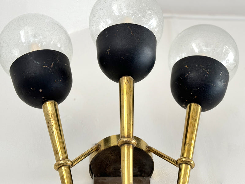 A Large Pair of Mid Century Brass Torch Wall Lights