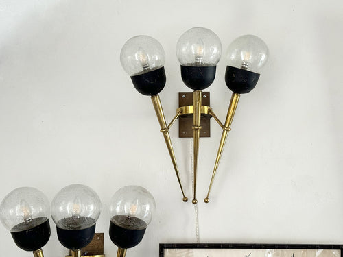 A Large Pair of Mid Century Brass Torch Wall Lights
