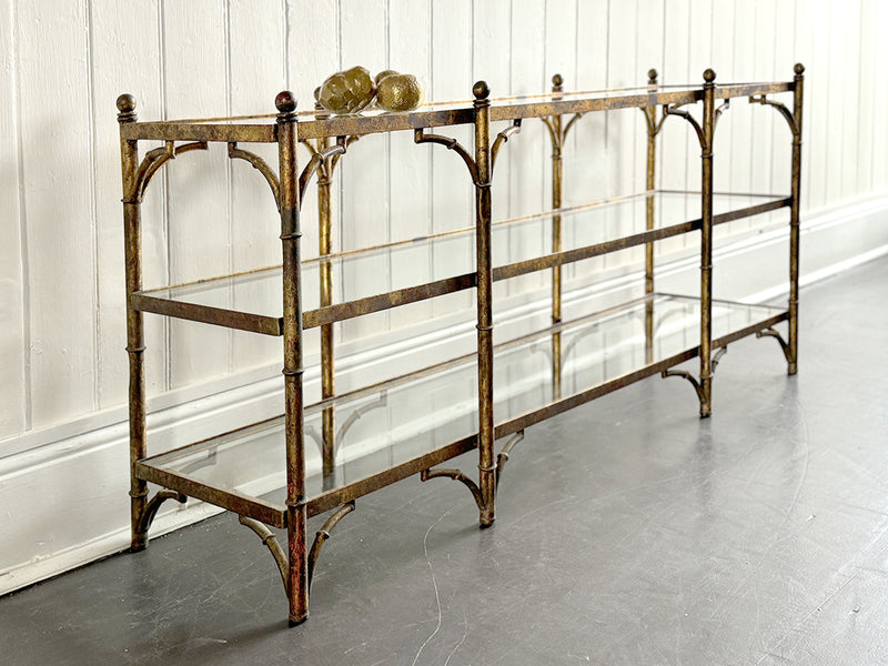 A Mid Century Spanish Gilt Metal Faux Bamboo Console Table with Glass Shelves
