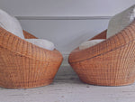 A Pair of 1970's Italian Round Rattan Lounge Chairs