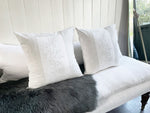 Two Antique White on White Embroidered 50cm Cushions with Linen Surround