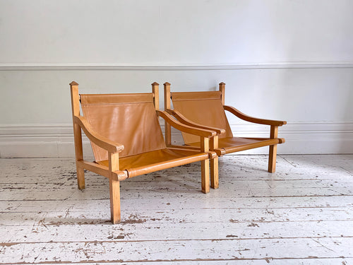 A Pair of 1960's Spanish Leather Sling Armchairs