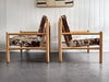 A Pair of 1970's Italian Lounge Armchairs with Cowhide Upholstery
